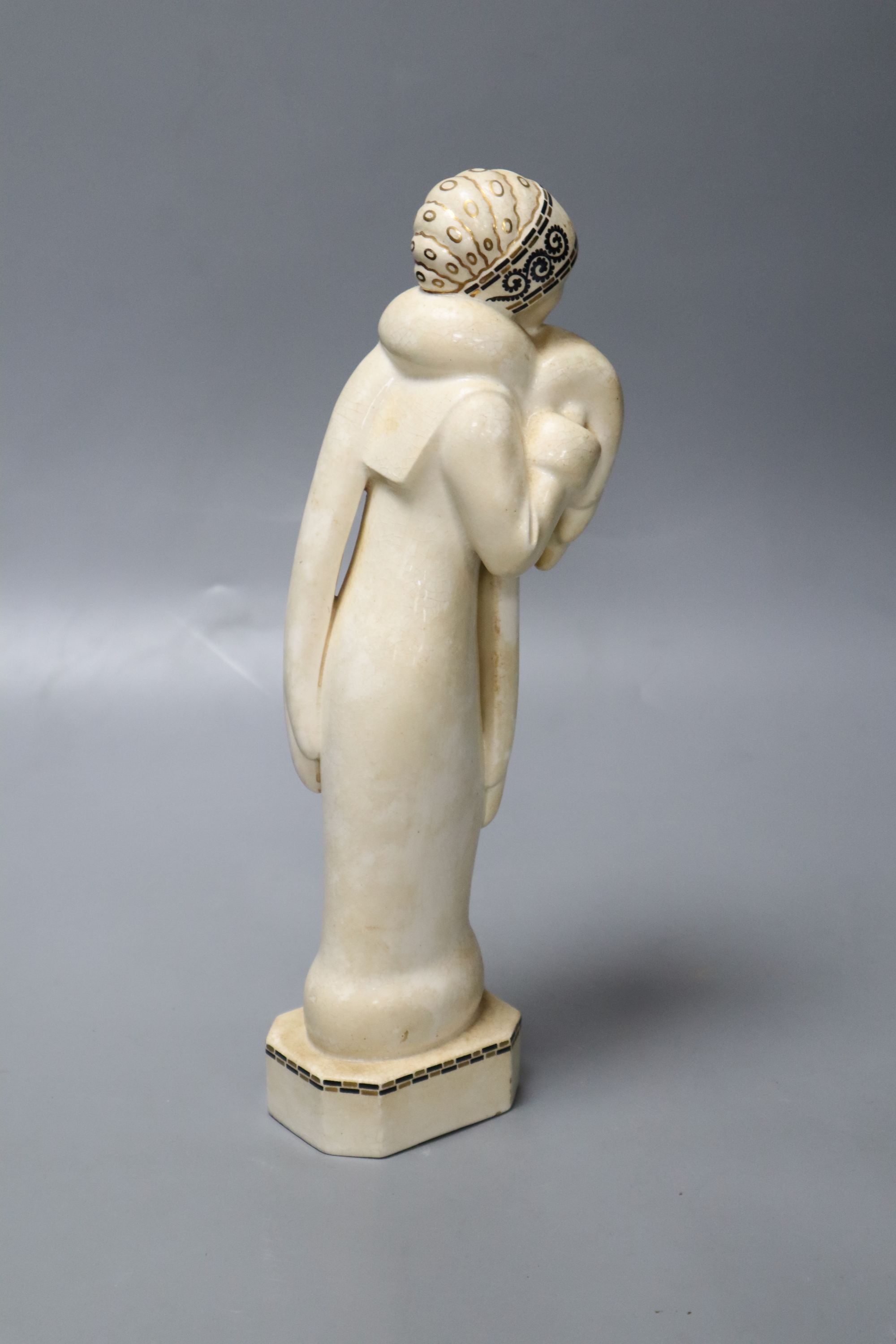 A 1920s pottery figure stamped Meissen, height 28.5cm
